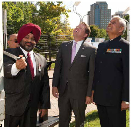 Deputy Mayor Steve Desroches and Indian High Commissioner Nirmal Verma watch as Jagdeep Perhar, President of the India Canada Association, raised India’s flag at Ottawa City Hall to mark the 66th anniversary of India’s Independence.